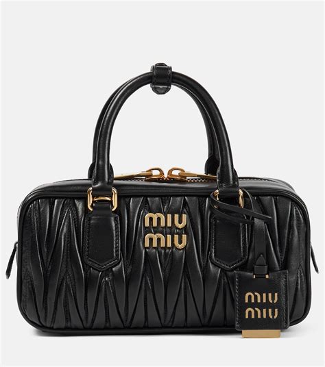 miu miu bag black leather|farfetch handbags miu.